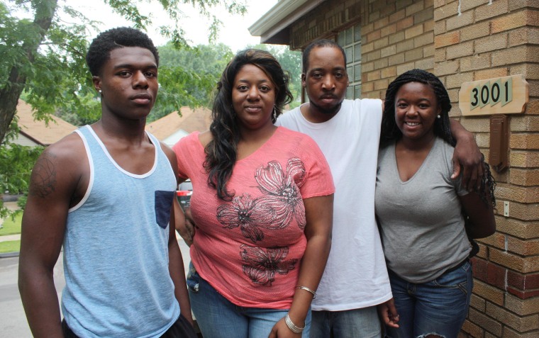 Image: The Trotter family stands for a portrait.