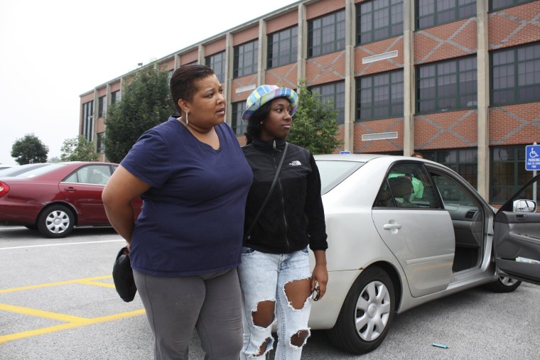 Image: Renee Perry stands beside her daughter Alia Perry