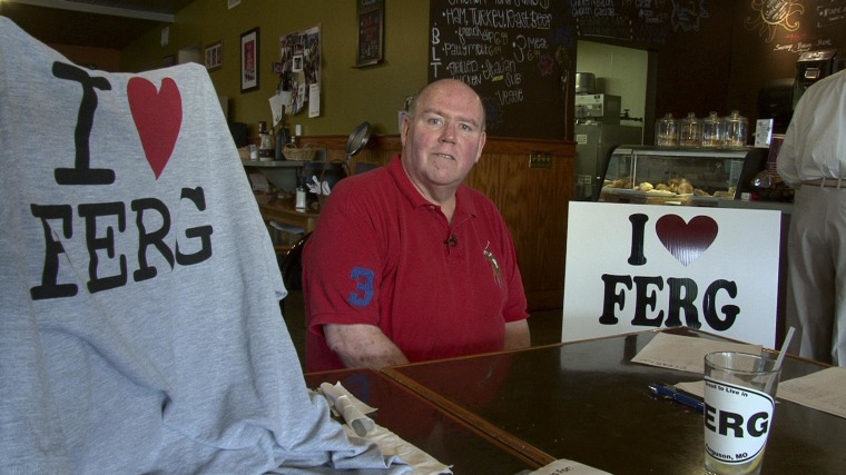Image: Brian Fletcher, who was mayor of Ferguson from 2005 to 2011, started a group called "I Love Ferg." He's collected thousands of dollars from local residents to buy lawn signs to "counteract the incorrect information that’s being given out nationally