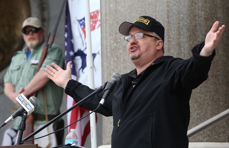 Image: Stewart Rhodes, founder and president of the pro gun rights organization Oath Keepers speaks  during a gun rights rally