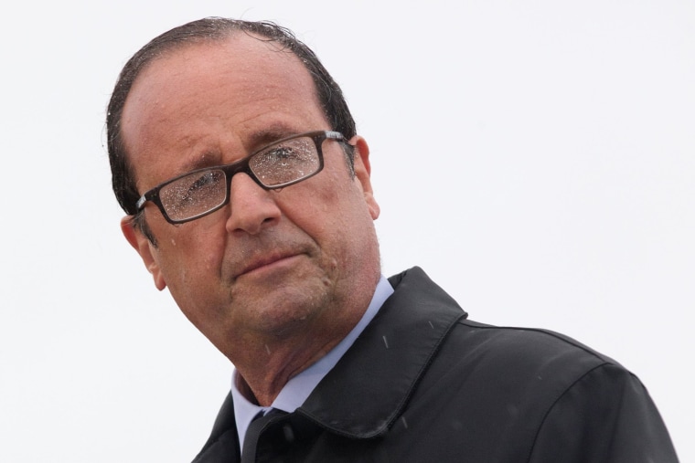 Image: French President Francois Hollande delivers a speech on the Ile de Sein, an island located near the Pointe-du-Raz, off the Brittany coast