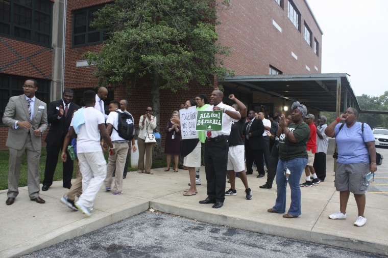 Teachers welcome students back to Normandy High School