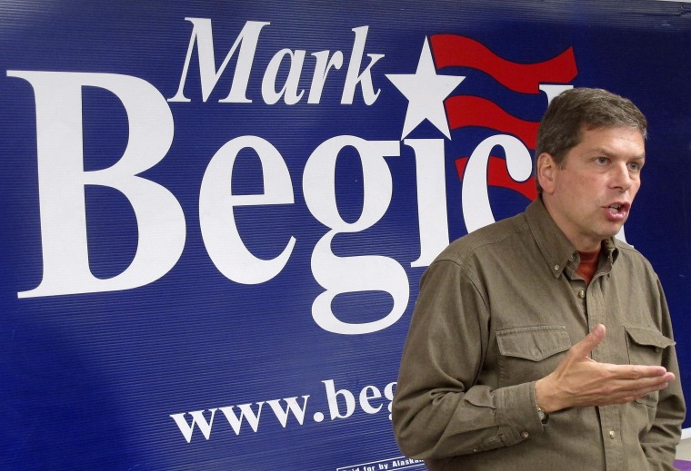 U.S. Sen. Mark Begich, D-Alaska, speaks at an event at his campaign headquarters on Wednesday, Aug. 6, 2014, in Anchorage, Alaska. A rift developed Thursday, Aug. 7, 2014, between Alaska's two U.S. senators when lawyers for Republican Lisa Murkowski demanded the campaign for Begich, her Democratic counterpart, pull ads that touts their cooperation in Washington for the benefit of Alaskans. (AP Photo/Becky Bohrer)