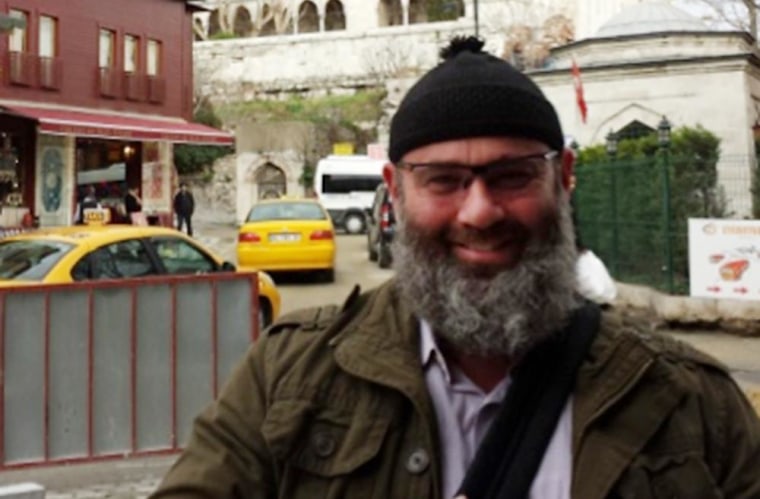 Don Morgan poses for a photo in front of Istanbul's Blue Mosque.