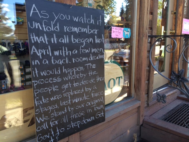 Image: A sign posted outside Ethan Hicks shop in Crested Butte, Colo.