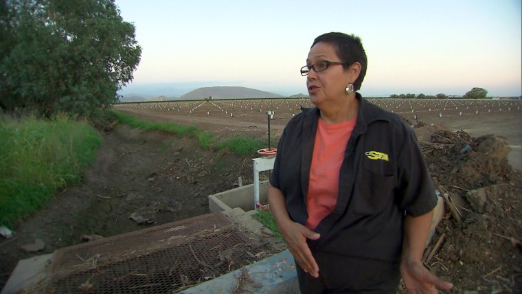 Image: Becky Quintana, resident of Seville, CA shows the old public water works infrastructure near her house.