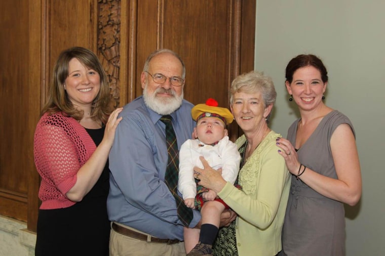 Image: Mark was adopted on his second birthday in 2012. He is shown here in the Buchanan tartan with his parents and sisters Amy Lumsden, left, and Jessica Buchanan.