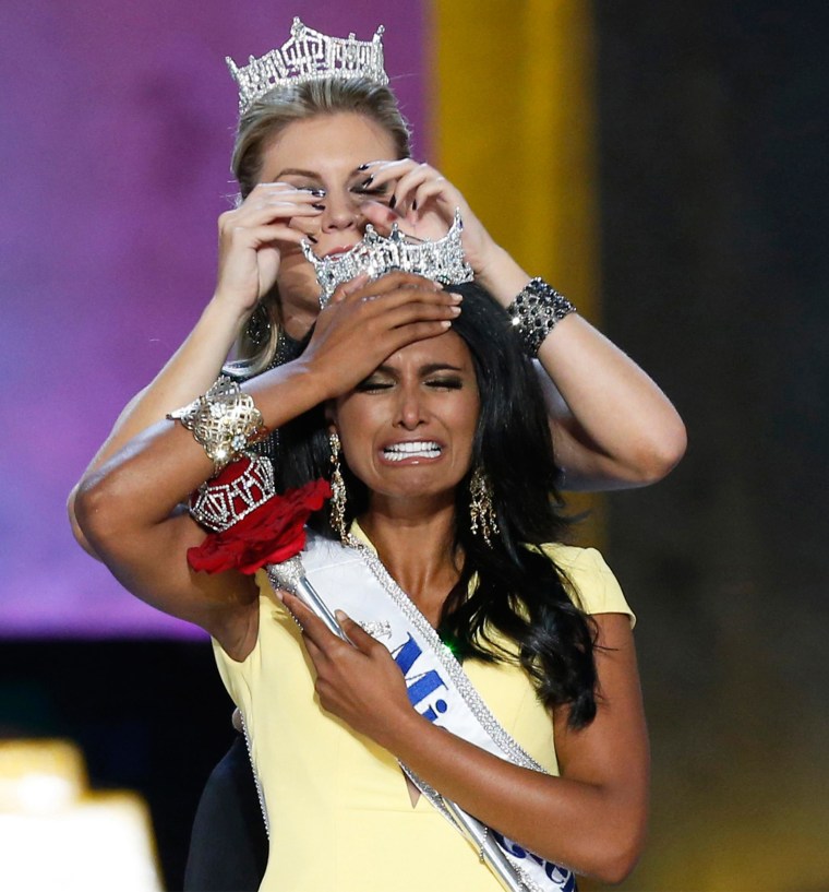 Image: Miss America contestant, Miss New York Nina Davuluri reacts after being chosen winner of the 2014 Miss America Pageant in Atlantic City, New Jersey