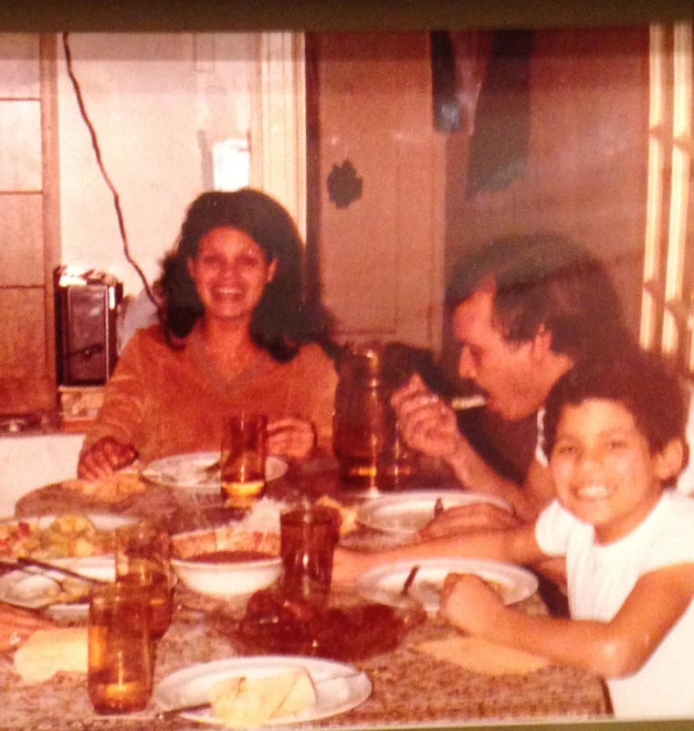 Chris with his parents, Braudelina and Joaquín, in 1982.