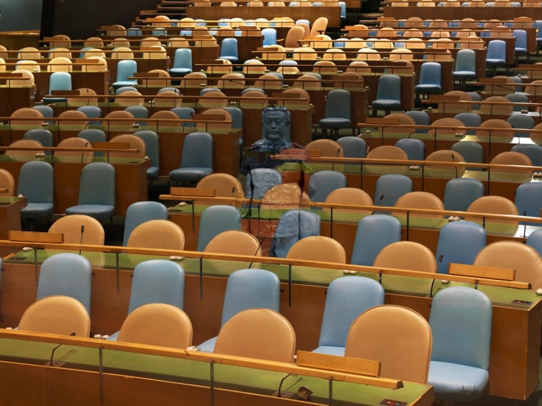 The artist "disappears" at the United Nations Headquarters in New York in this photograph, from Liu Bolin's "Hiding in the City" series, part of "A Colorful World?" exhibition at the Klein Sun Gallery in New York.