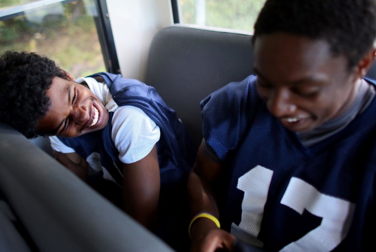 Image:  David Weathers (left,) a 17-year-old freshman at Williams College in Williamstown, MA, laughs with a football teammate