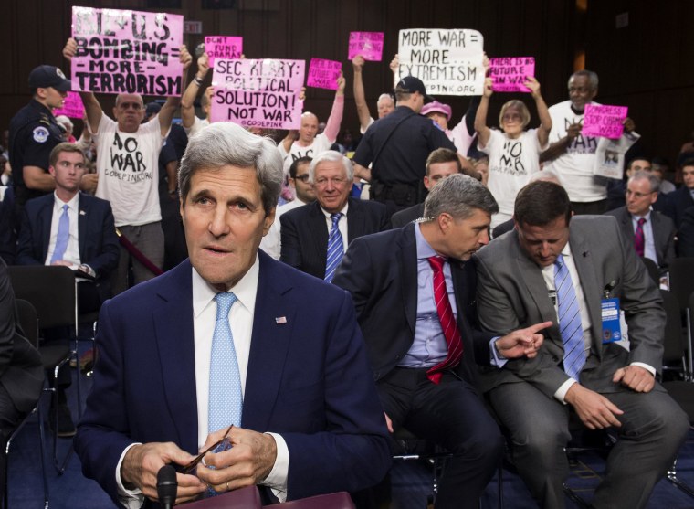 Image: Protesters Interrupt Kerry Senate Hearing on ISIS