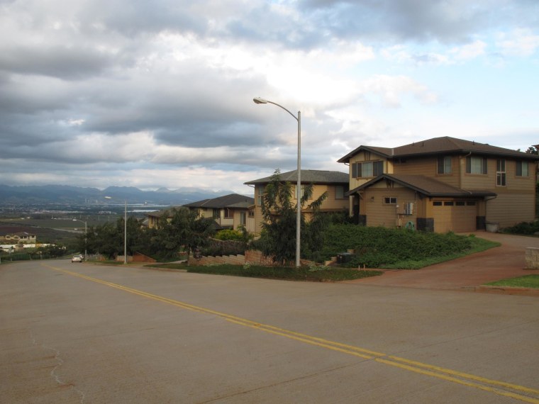 Image: The home, right, of civilian defense contractor Benjamin Pierce Bishop in Kapolei, Hawaii