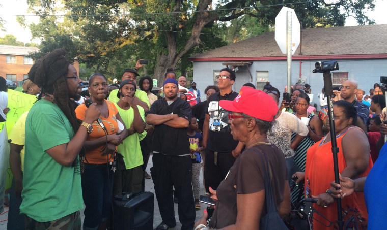 Image: The scene at a peaceful rally after an officer-invovled shooting in West Savannah, Ga.