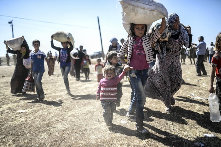 Image: TURKEY-SYRIA-KURDS-REFUGEES
