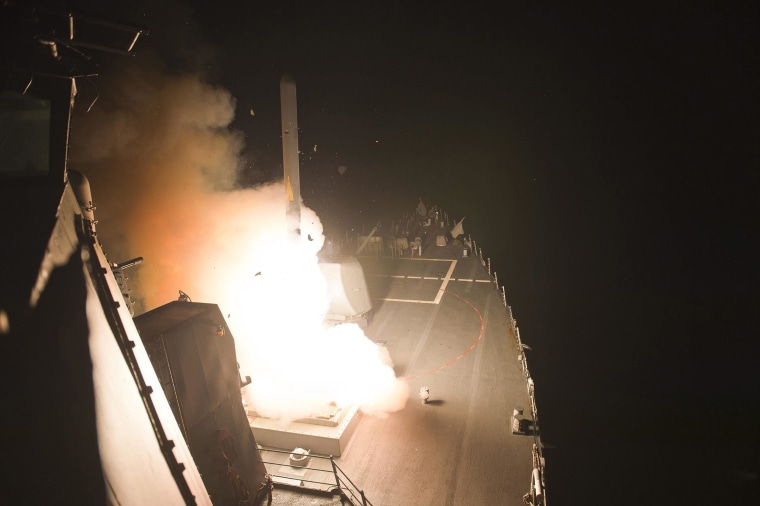 Image: The guided-missile destroyer USS Arleigh Burke (DDG 51) launches a Tomahawk cruise missiles at ISIS targets in Syria