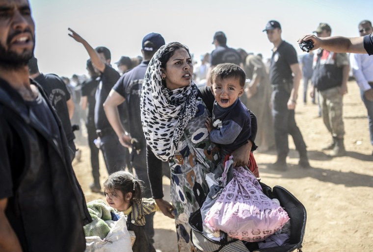 Image: Syrian Kurds Cross Border Into Turkey
