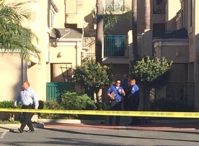 IMAGE: Police outside Bell Gardens, California, Mayor Daniel Crespo's home