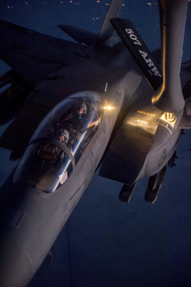 Image: A F-15E Strike Eagle receives fuel from a KC-135 Stratotanker over northern Iraq after conducting airstrikes in Syria