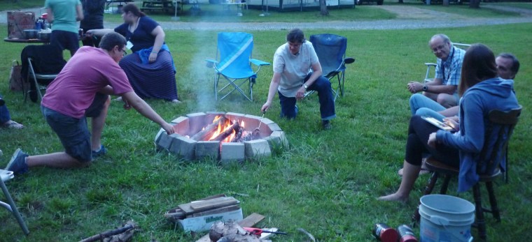 Image: Workers roast marshmallows during their quarantine at the 90-acre campus of SIM, the Christian aid organization.