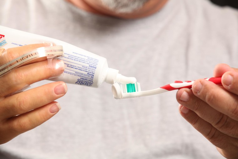 Image: Prosthetic Hand Squeezing Toothpaste