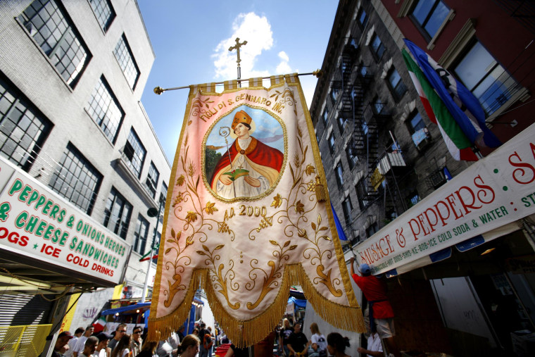 San Gennaro banner carried in New York's Little Italy during 80th Feast of San Gennaro