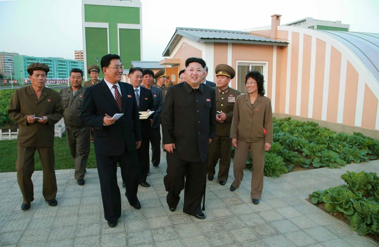 Image: North Korean leader Kim Jong Un gives field guidance at the newly built Wisong Scientists Residential District  in this undated photo released by KCNA