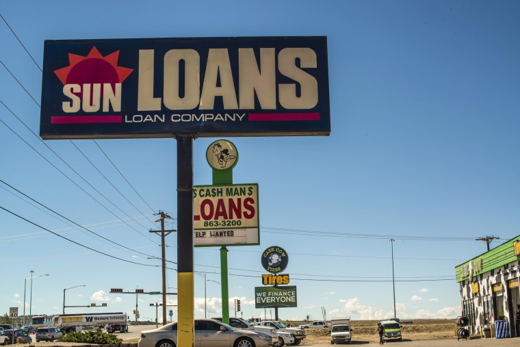 Image: Loan company signs in Gallup, N.M.