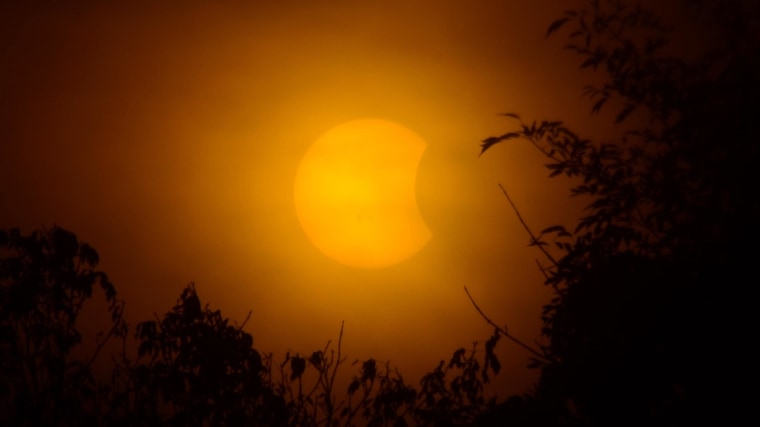 Image: The partial solar eclipse is visible from Louisville, Ky.