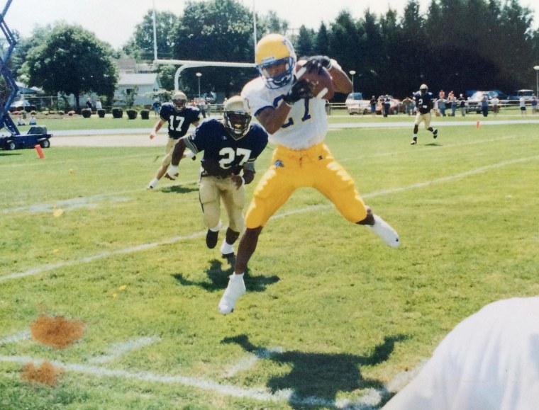 Image: Mike Clark 1993 Sayreville H.S. graduate, catches a pass during a game.