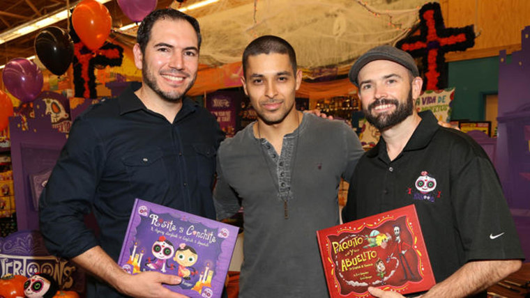 Co-Creator and Animation Director of Muertoons, Eric Gonzalez, Wilmer Valderrama, and Co-Creator of Muertoons, Erich Haeger, pose during the new animated series launch of “Muertoons” on Friday, Oct. 24, 2014 at the Northgate Gonzalez Market in Los Angeles, Calif.