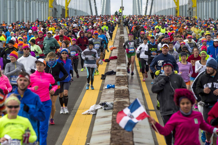 Image: Runners cross the Verrazano-Narrows Bridge shortly after the start of the New York City Marathon in New York