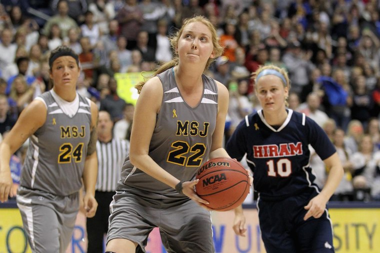 Image: Lauren Hill of Mount St. Joseph shoots to score her second basket during the game against Hiram at Cintas Center on Nov. 2