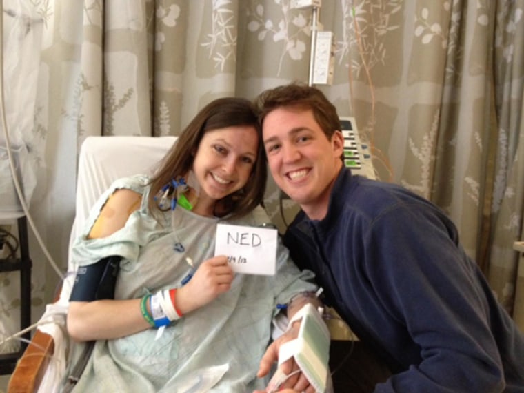 Emily Bennett Taylor and her husband Miles in 2013, celebrating NED or “no evidence of disease." Today, Emily Bennett Taylor is cancer-free after chemotherapy, lung surgery and radiation.