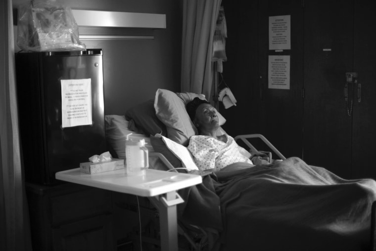 Edna Irvin lies in her bed at the Arkansas Health Center in Benton, Ark. A Center for Public Integrity analysis of more than 10,000 nursing homes across the country found that Arkansas was one of two states where the daily level of registered nurse care listed on public website Nursing Home Compare was at least twice the level the Center calculated from an analysis of annual financial cost reports. The Arkansas Health Center was not included in the analysis.