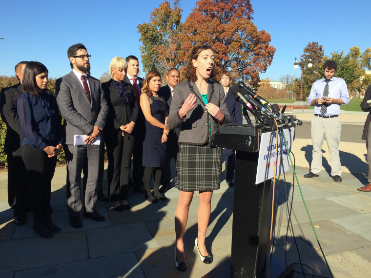 Image: Elizabeth Perez, 36, a former Marine staff sergeant speaks at a news conference urging President Barack Obama to take bold executive action on immigration