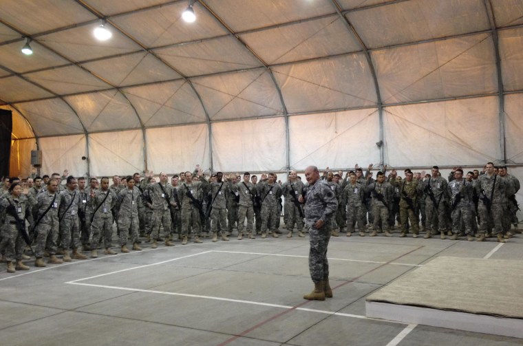 Image: U.S. Army General Martin Dempsey, chairman of the Joint Chiefs of Staff, speaks with soldiers in Iraq