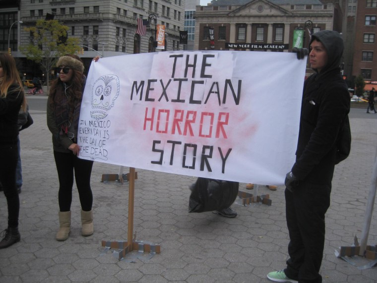 Fathers, mothers, children, activists and others gathered for a vigil in New York City on Sunday, Nov. 16 to demand justice for the 43 students from Guerrero, Mexico who disappeared over 7 weeks ago.