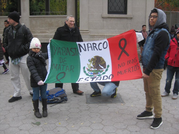 Fathers, mothers, children, activists and others gathered for a vigil in New York City on Sunday, Nov. 16 to demand justice for the 43 students from Guerrero, Mexico who disappeared over 7 weeks ago.