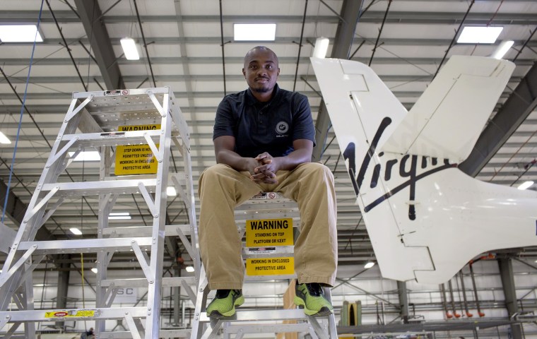 Robert Kaai, 34, is "SpaceWrench" for Virgin Galactic — which means he helps maintain the vehicles before and after flight. He was previously a mechanic at Frontier Airlines.