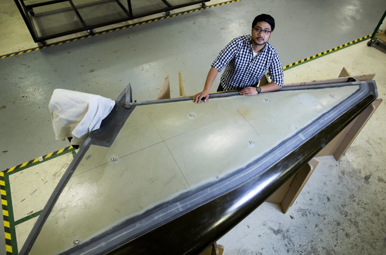 Zia Qadir is structural design engineer at The Spaceship Company, and is involved in testing components for SpaceShipTwo Serial No. 2. He's working on a SpaceShipTwo horizontal stabilizer that will be used for static testing.