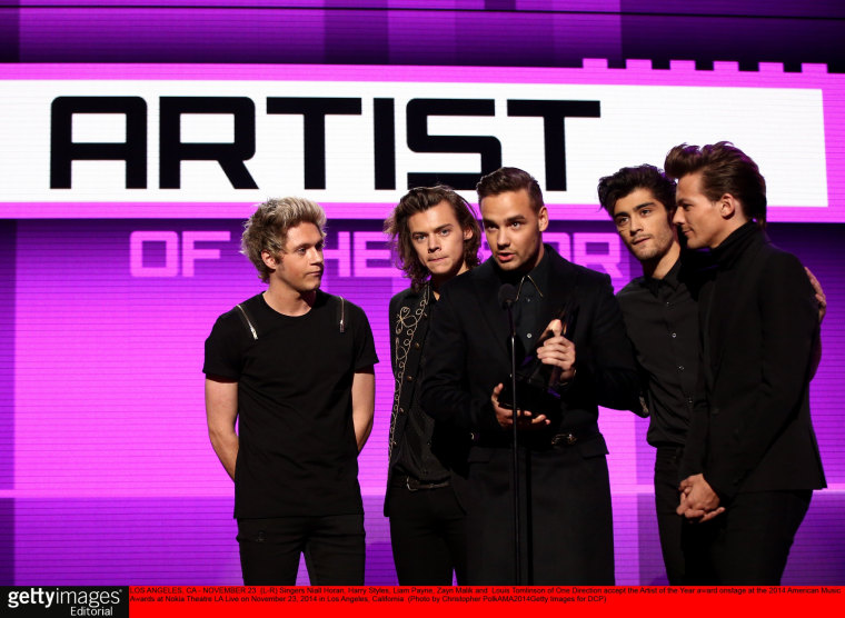 Singers Niall Horan, Harry Styles, Liam Payne, Zayn Malik and  Louis Tomlinson, from left to right, of One Direction accept the Artist of the Year award onstage at the 2014 American Music Awards at Nokia Theatre L.A. Live on Nov. 23, 2014 in Los Angeles, California. 