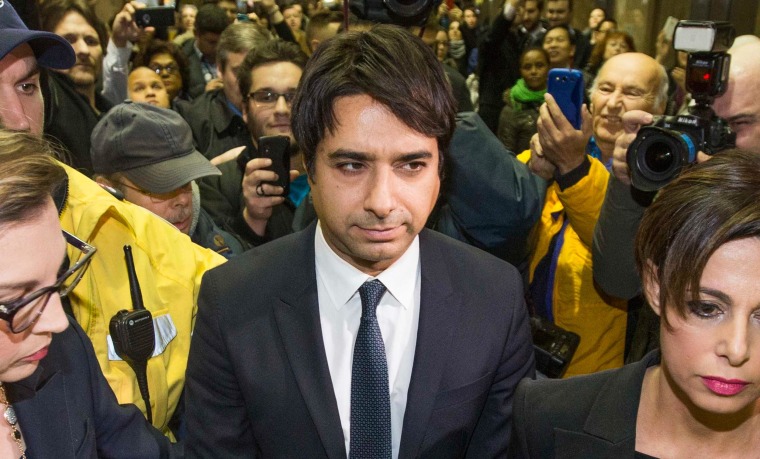 Image: Celebrity radio host Ghomeshi leaves court after getting bail on multiple counts of sexual assault in Toronto