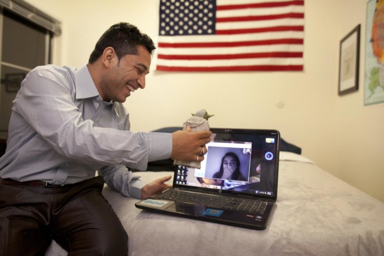 Image: Former interpreter Mohammed talks to his sister back in Afghanistan from his new home in the U.S.