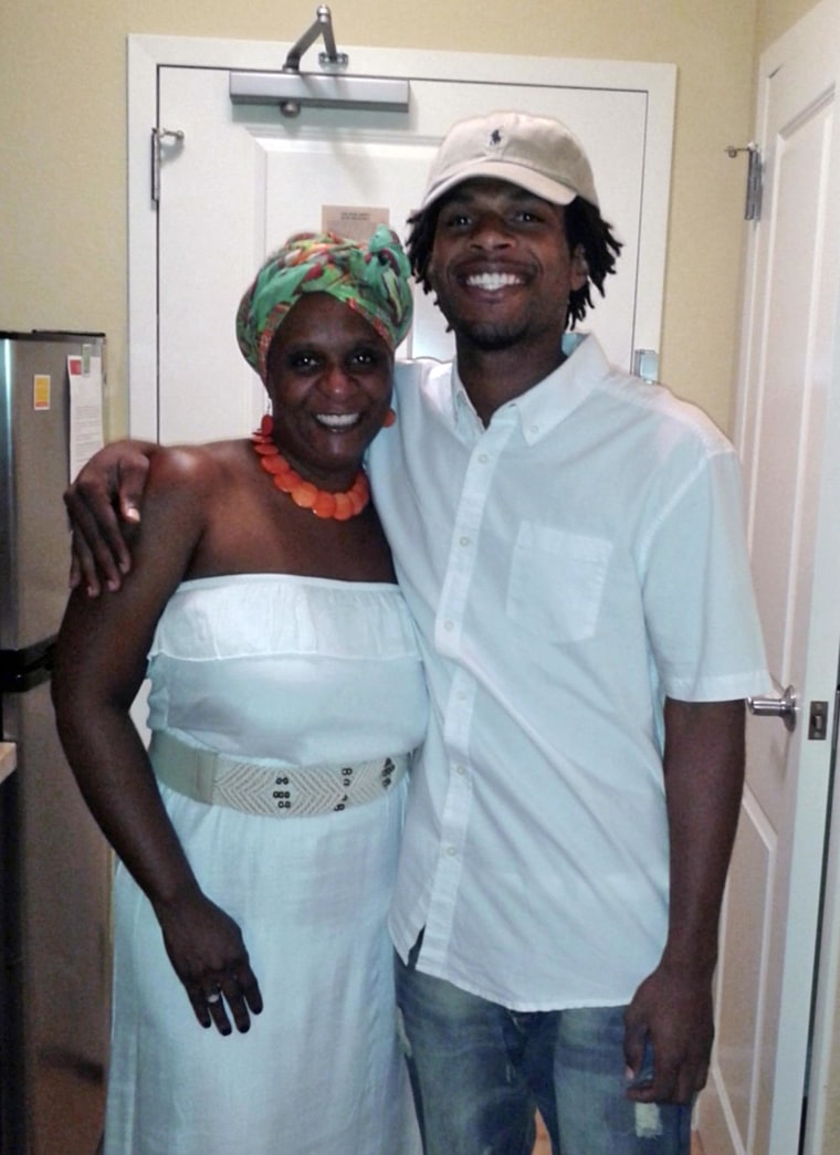 Image: John Crawford III, right, and his mother Tressa Sherrod