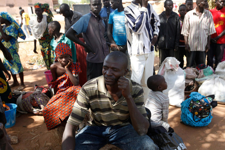 Image: Civilians flee Boko Haram attacks