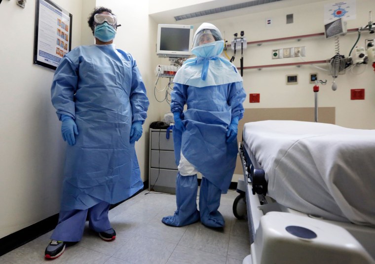 Image: Bellevue Hospital nurse Belkys Fortune, left, and Teressa Celia, Associate Director of Infection Prevention and Control