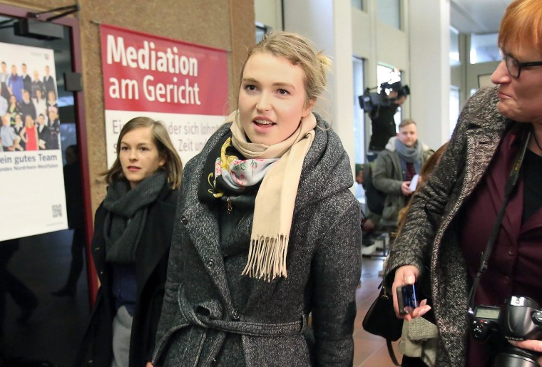 Image: Josephine Witt arrives at a courtroom in Cologne, Germany