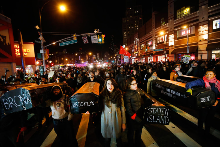 Image: Protesters rallying against a grand jury's decision not to indict the police officer involved in the death of Eric Garner