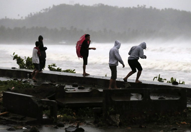 Image: Residents evacuate due to Typhoon Haqupit